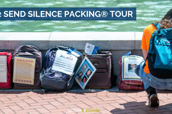 Photo of a student squatting down to read a story on a backpack at Active Minds' Send Silence Packing® display. Text reads 