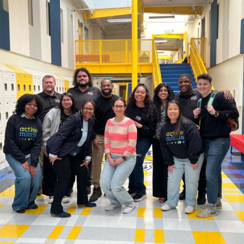 Active Minds staff and Central City Value High School representative pose for group photo